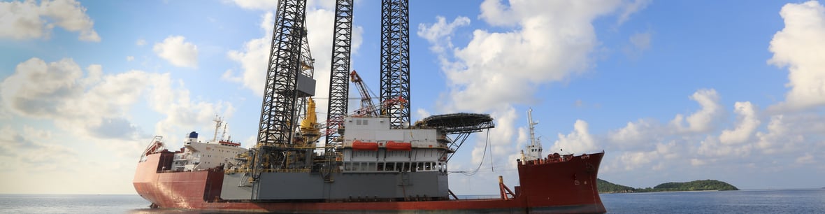 Open gear grease application for offshore operations
